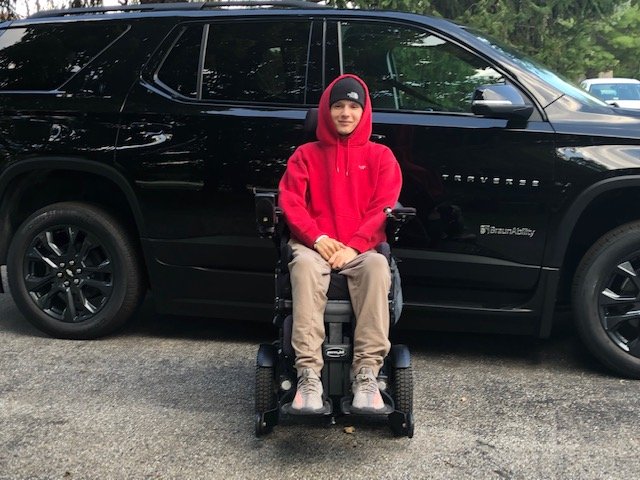 A family with their new accessible van
